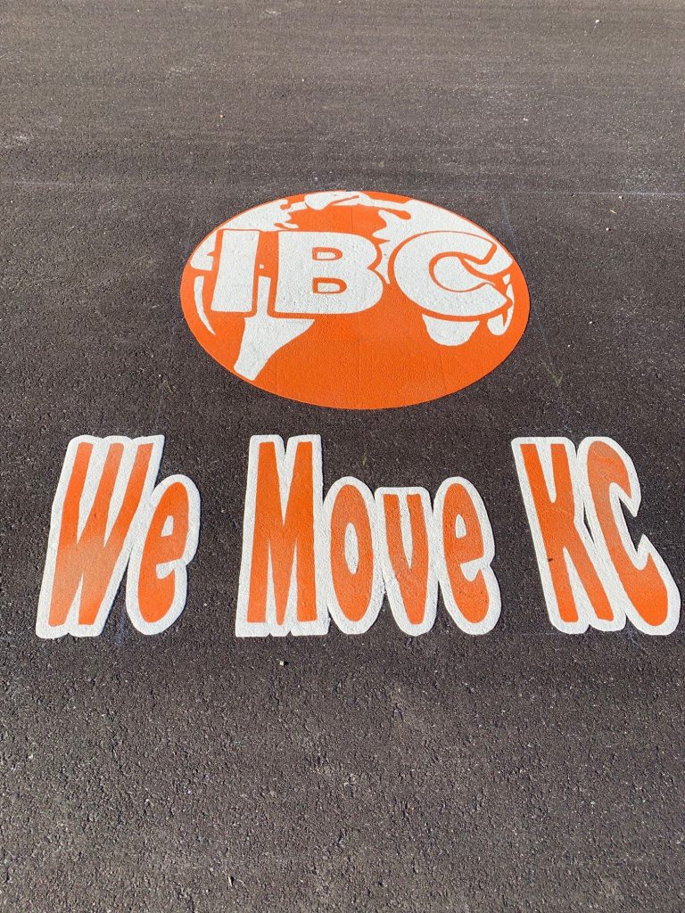 IBC logo on pavement with We Move KC tagline