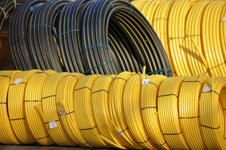 Plastic pipe coils yellow and black