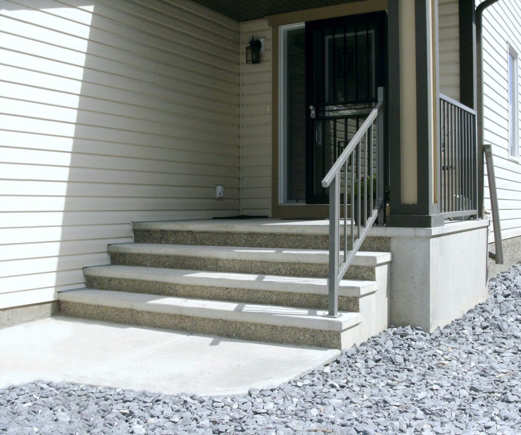 precast concrete front steps of house