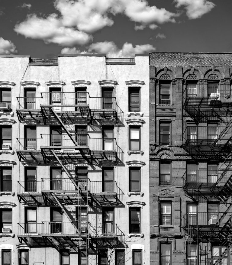 black and white old apartment buildings